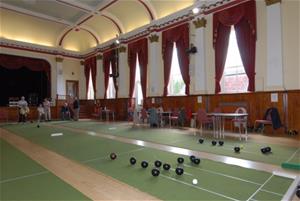 Mat bowls being played in the Assembly Room at Victoria Hall
